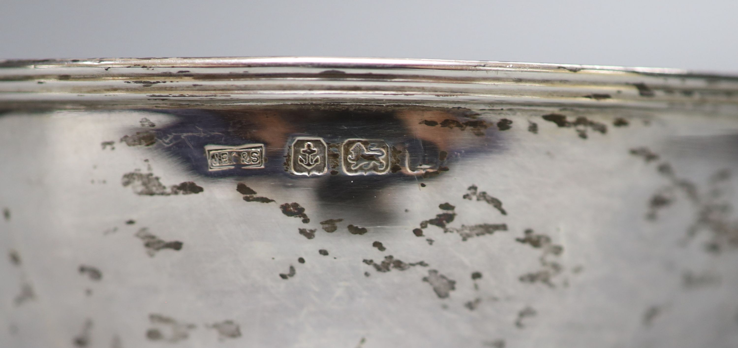 A George V silver bowl, Birmingham, 1910 and a silver mounted glass coaster.